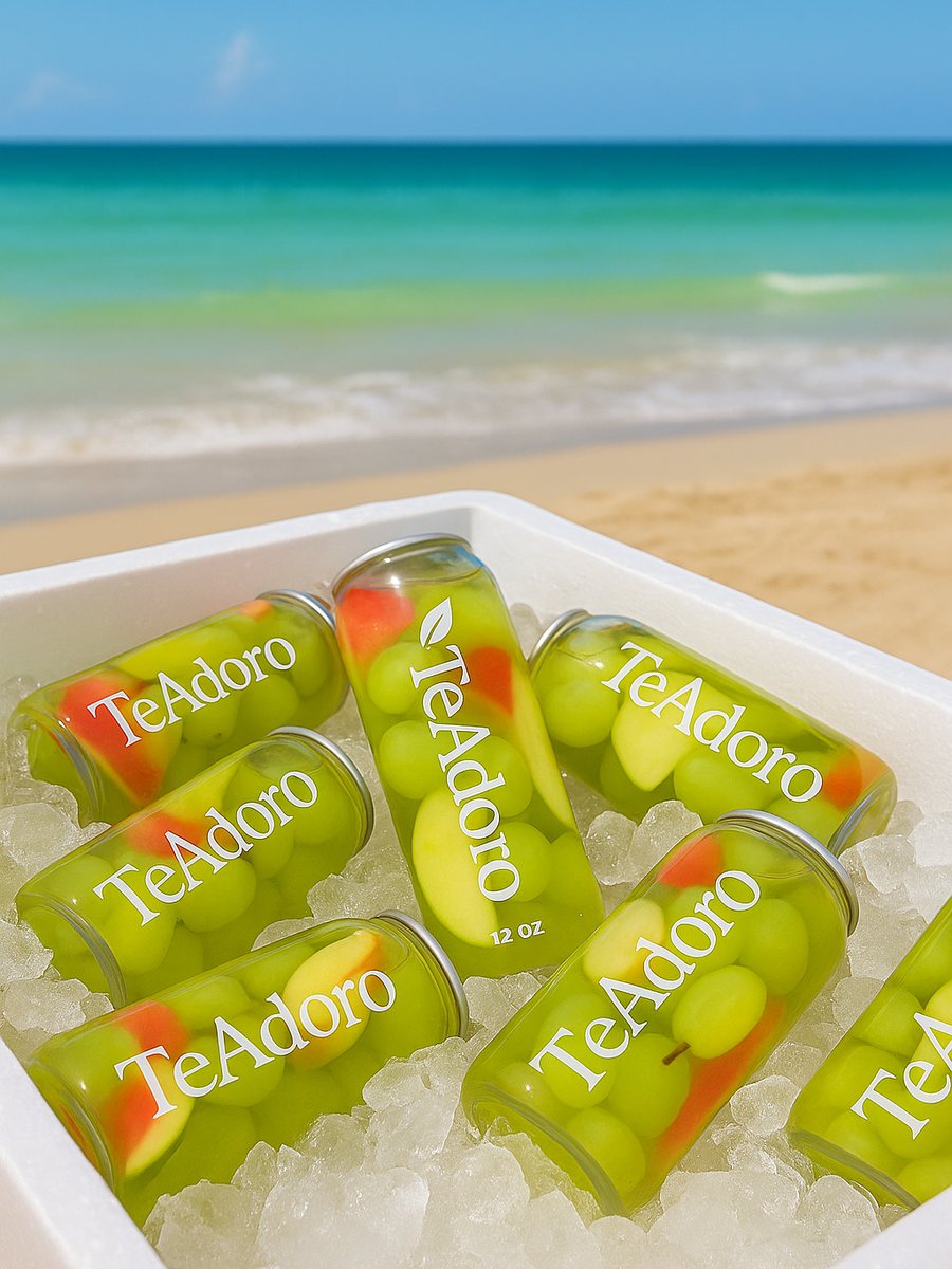 A tray of TeAdoro cans on ice at the beach